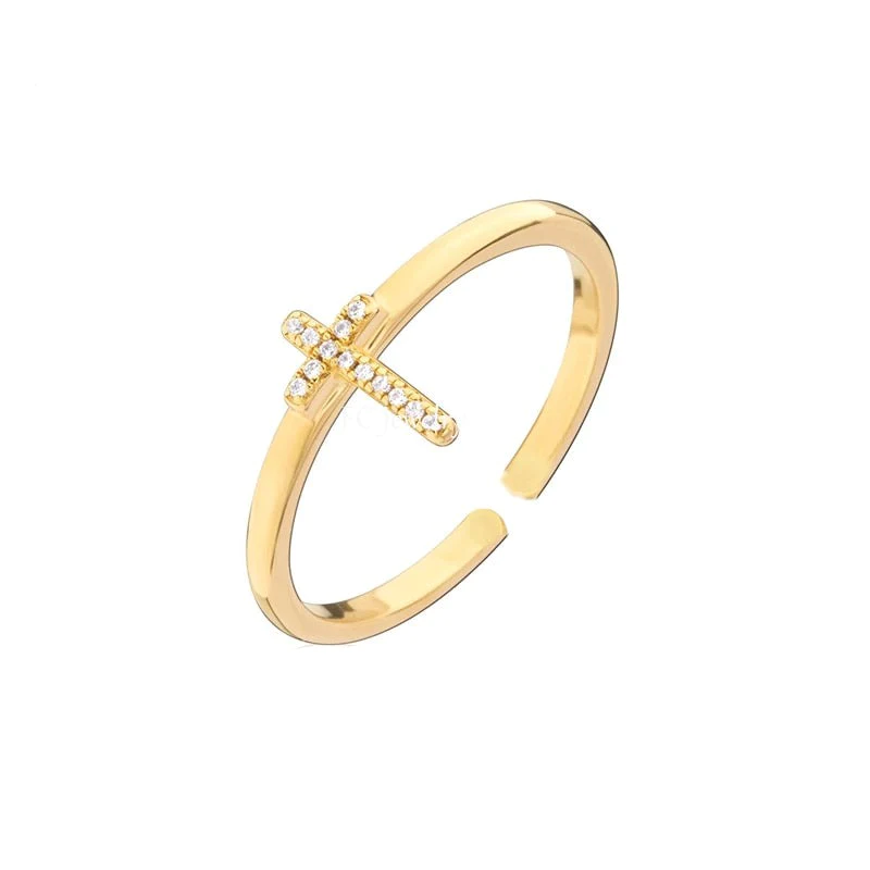 ring met diamant en gouden christelijk kruis
